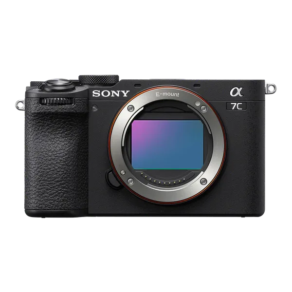Close-up of a Sony camera body without a lens attached, showing the front with a digital display and textured grip.